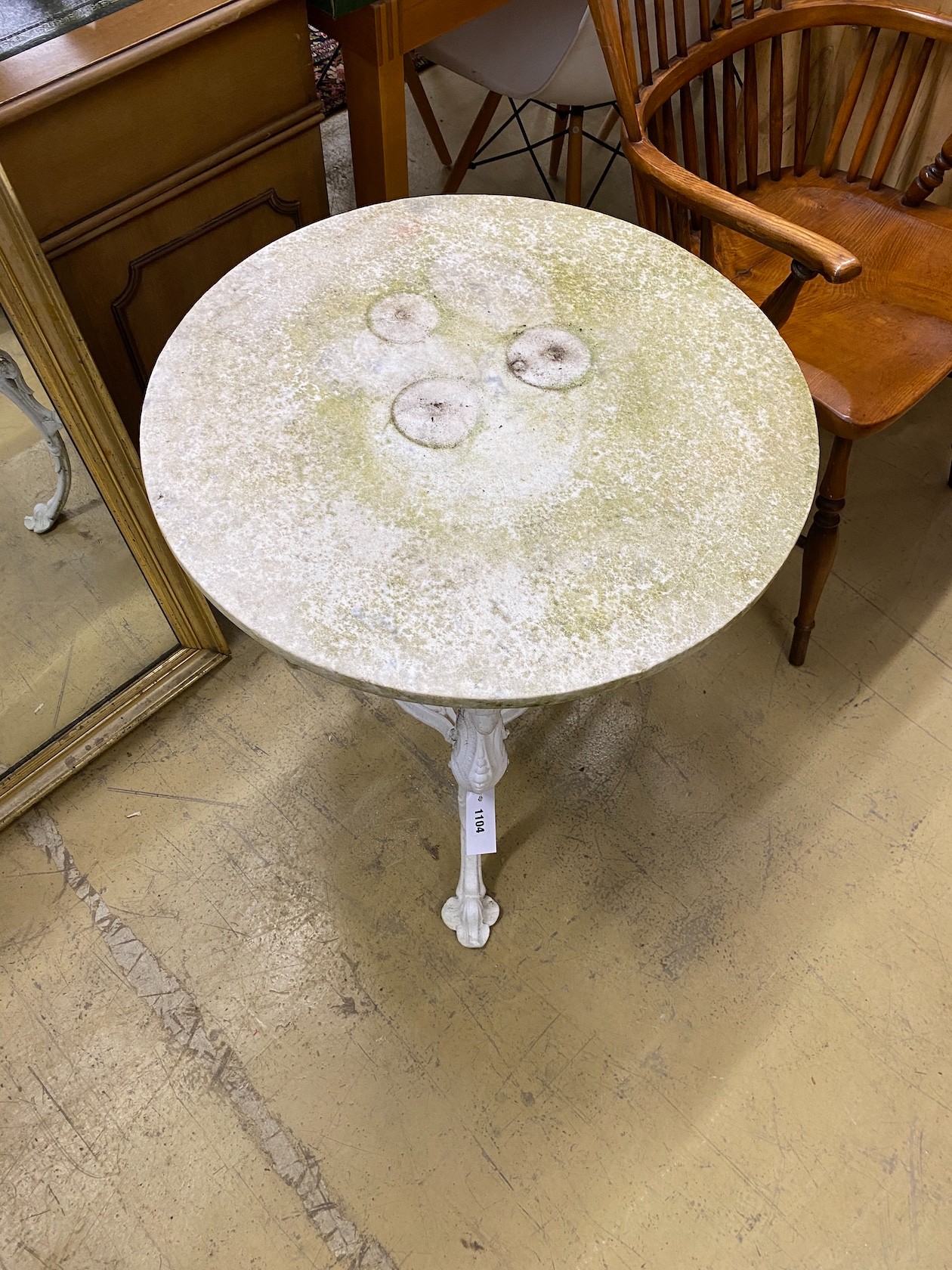 A white painted aluminium circular garden table with circular white marble top, diameter 61cm, height 69cm